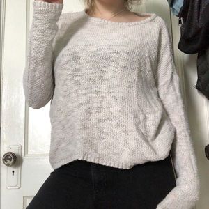 A light sweater that is cream or white